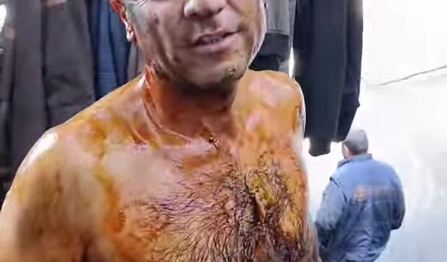 Mesai arkadaşları, emekli olan madencinin elbiselerini parçalayıp yağ dökerek uğurladı